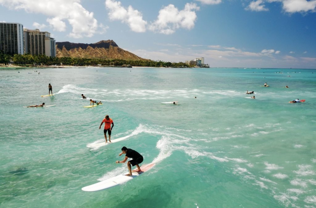 Prople surfing in Hawai